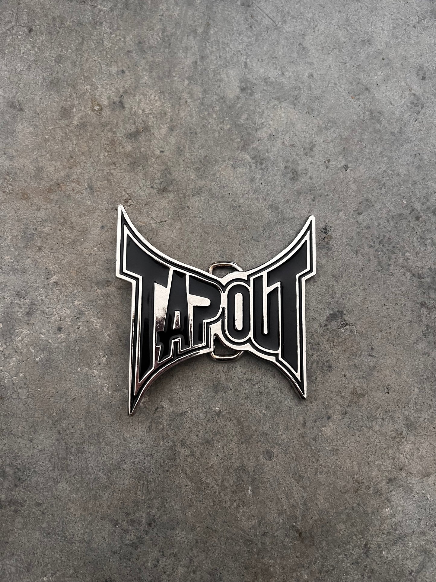 Tapout belt buckle