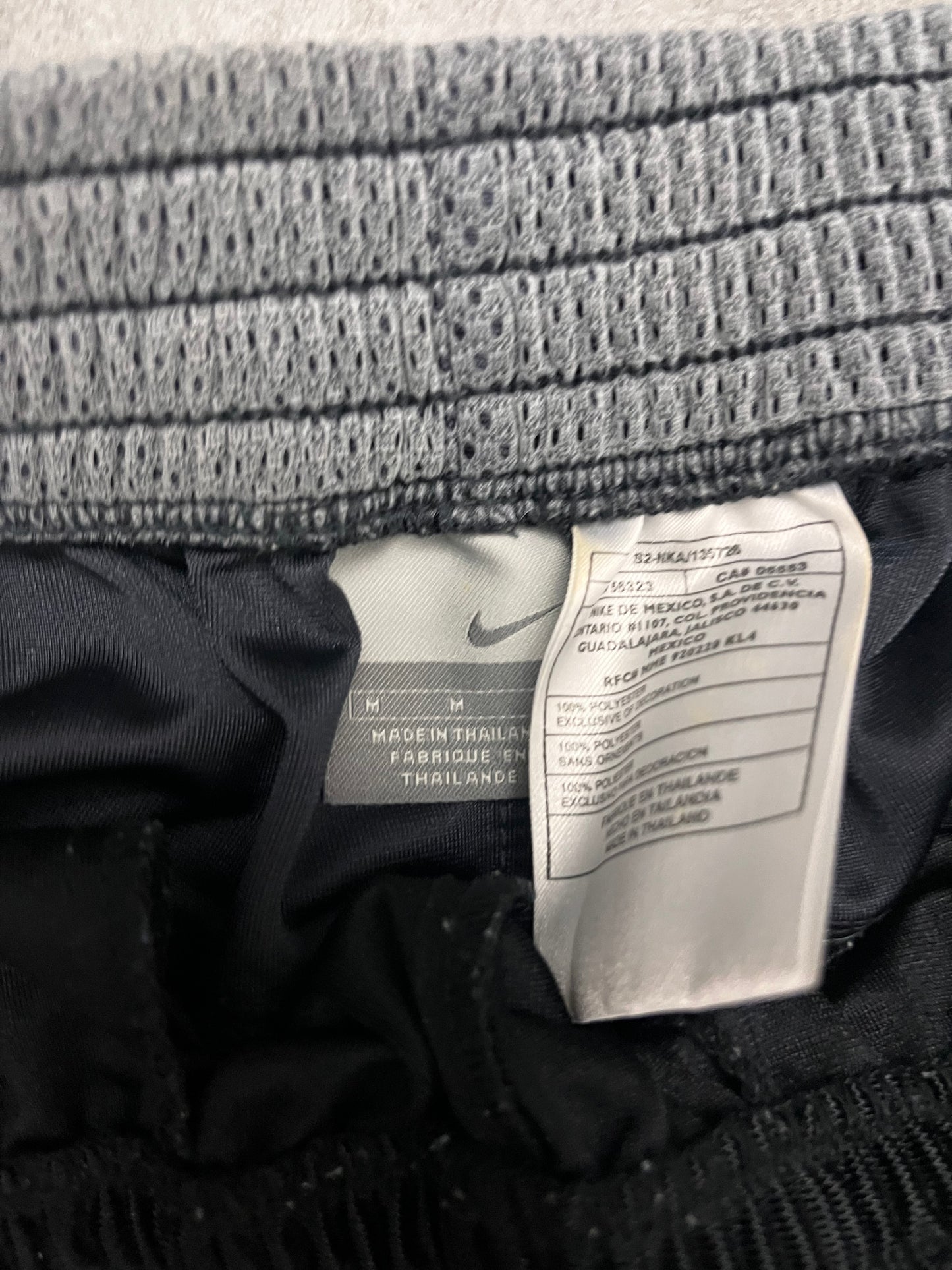 Nike trackies - M